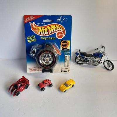 Hot wheels Keychain with assortment of other small cars and a motorcycle