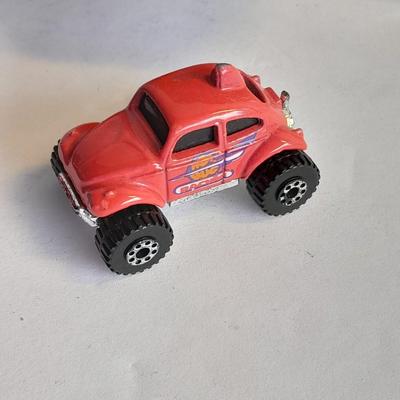 Hot wheels Keychain with assortment of other small cars and a motorcycle
