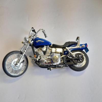 Hot wheels Keychain with assortment of other small cars and a motorcycle