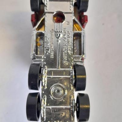 Two Semi Trucks one with trailer Road Champs, and Hot Wheels, and Matchbox Refuse Truck