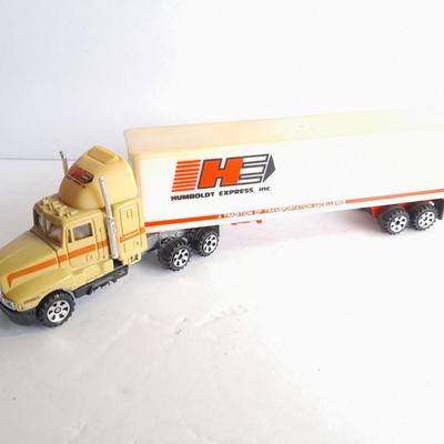 Two Semi Trucks one with trailer Road Champs, and Hot Wheels, and Matchbox Refuse Truck