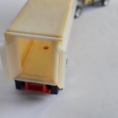 Two Semi Trucks one with trailer Road Champs, and Hot Wheels, and Matchbox Refuse Truck