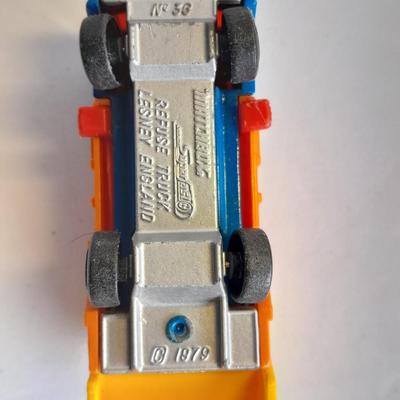 Two Semi Trucks one with trailer Road Champs, and Hot Wheels, and Matchbox Refuse Truck