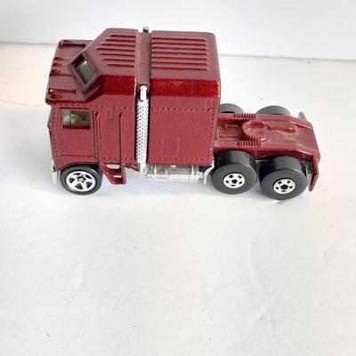 Two Semi Trucks one with trailer Road Champs, and Hot Wheels, and Matchbox Refuse Truck