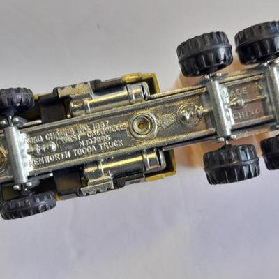Two Semi Trucks one with trailer Road Champs, and Hot Wheels, and Matchbox Refuse Truck