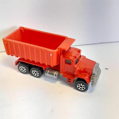Two Semi Trucks one with trailer Road Champs, and Hot Wheels, and Hot Wheels Dump Truck
