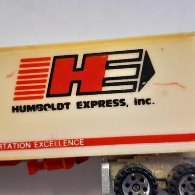 Two Semi Trucks one with trailer Road Champs, and Hot Wheels, and Hot Wheels Dump Truck