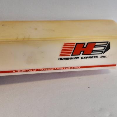 Three advertisement Semi Trucks and one trailer Road Champs, and Matchbox,