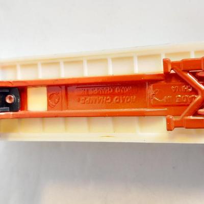 Three advertisement Semi Trucks and one trailer Road Champs, and Matchbox,