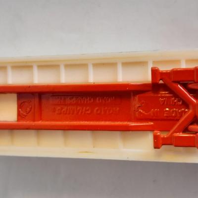 Three advertisement Semi Trucks and one trailer Road Champs, and Matchbox,