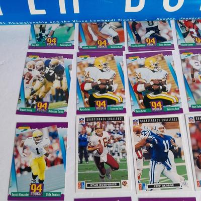 Football trading cards with Super Bowl XXI Poster and Dunn Deal Warrick Dunn poster