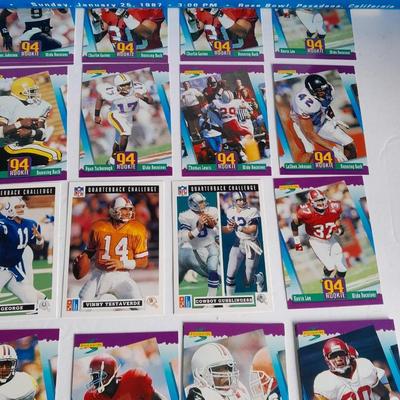 Football trading cards with Super Bowl XXI Poster and Dunn Deal Warrick Dunn poster