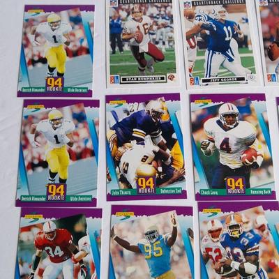 Football trading cards with Super Bowl XXI Poster and Dunn Deal Warrick Dunn poster