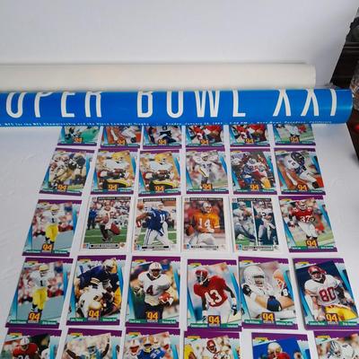 Football trading cards with Super Bowl XXI Poster and Dunn Deal Warrick Dunn poster