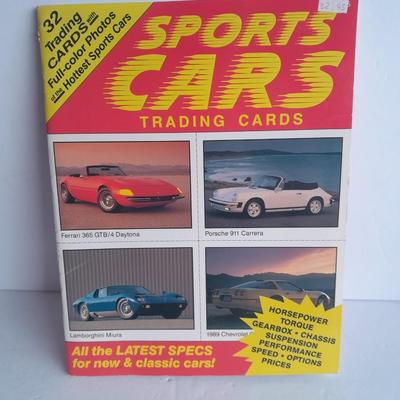1978 Ford Thunderbird manual, Bob's Antique Auto parts book, Antique Ford Manual and sports cars cards