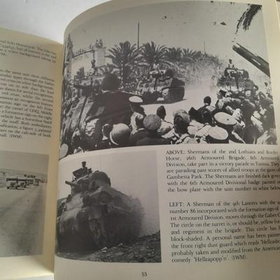 Military books, Field Guide booklets, and a Side cap