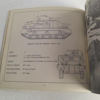 Military books, Field Guide booklets, and a Side cap