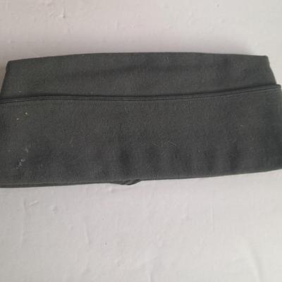 Military books, Field Guide booklets, and a Side cap