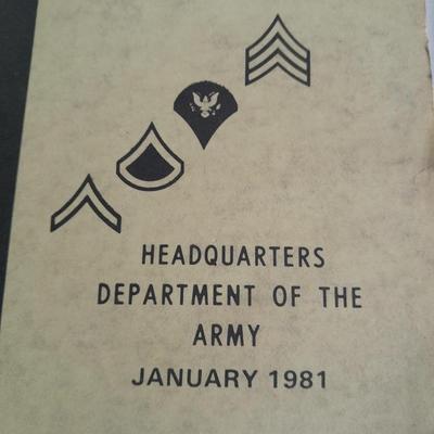 Military books, Field Guide booklets, and a Side cap