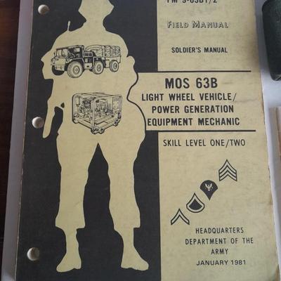 Military books, Field Guide booklets, and a Side cap