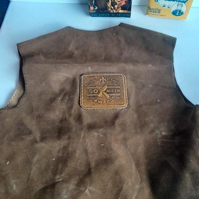 Boy Scouts / Cub scouts of America vest, canteen, and books