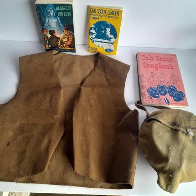 Boy Scouts / Cub scouts of America vest, canteen, and books