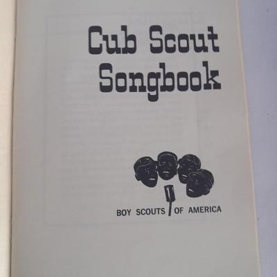 Boy Scouts / Cub scouts of America vest, canteen, and books