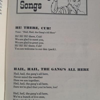 Boy Scouts / Cub scouts of America vest, canteen, and books