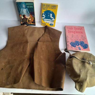 Boy Scouts / Cub scouts of America vest, canteen, and books