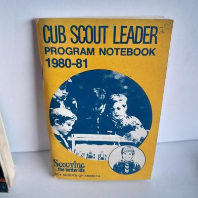 Boy Scouts / Cub scouts of America vest, canteen, and books