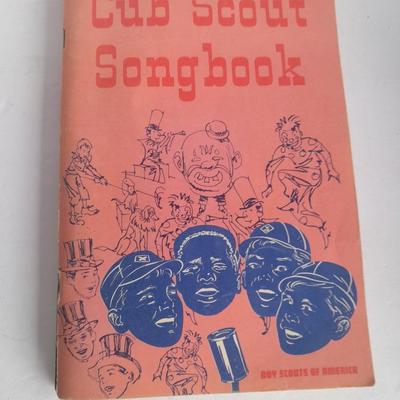 Boy Scouts / Cub scouts of America vest, canteen, and books