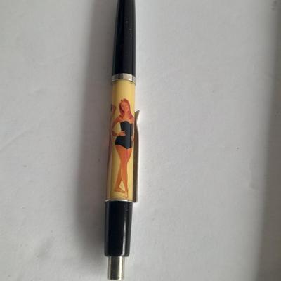 Vintage Swimsuit dropping pen, seduction book, and 1959 Ice Follies program booklet