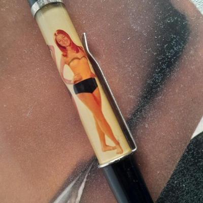 Vintage Swimsuit dropping pen, seduction book, and 1959 Ice Follies program booklet