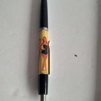 Vintage Swimsuit dropping pen, seduction book, and 1959 Ice Follies program booklet