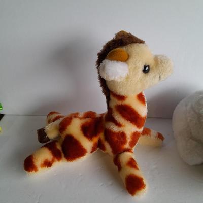 Plush animals, Vintage giraffe, Slumber Bunny, and Frozen 11 Dragon