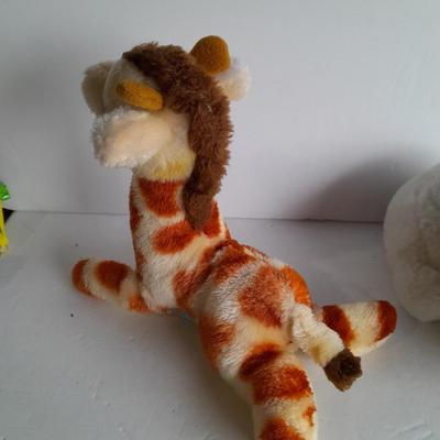 Plush animals, Vintage giraffe, Slumber Bunny, and Frozen 11 Dragon