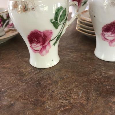 Lot of 4 tea cups, 4 saki cups, 5 gold rim trinket plates, 2 saucers.