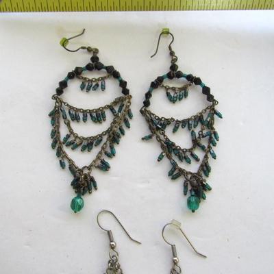 Lot 311: Two Nice Pair Long Dangle Earrings