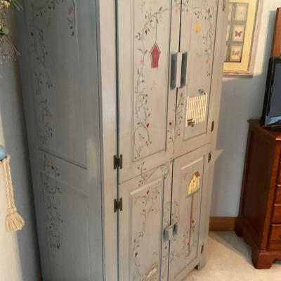 4 Door Cabinet 72â€ Tall 36â€ Wide and 23â€ Deep.