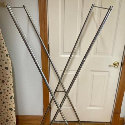 Adjustable and Foldable laundry Rack.
