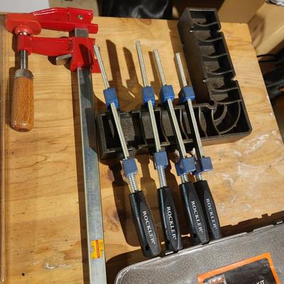 Table Lot of tools, DeWalt 10" Saw Blades, Metric Socket set Deep Wall Sockets, 6" Dado , Rivet Set, Clamps