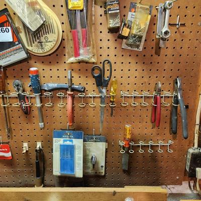Workshop Left Pegboard and Items on top of Bench. Snap on Drivers tools