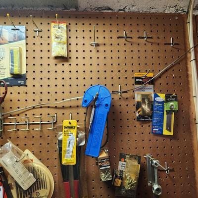 Workshop Left Pegboard and Items on top of Bench. Snap on Drivers tools
