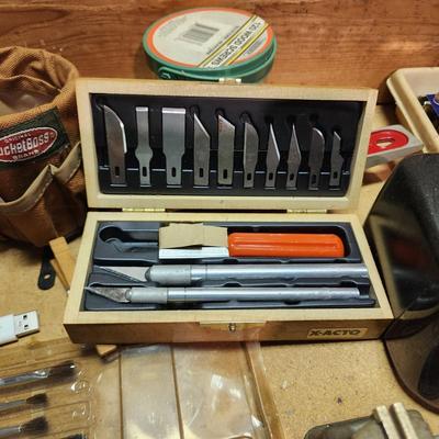 Workshop Left Pegboard and Items on top of Bench. Snap on Drivers tools