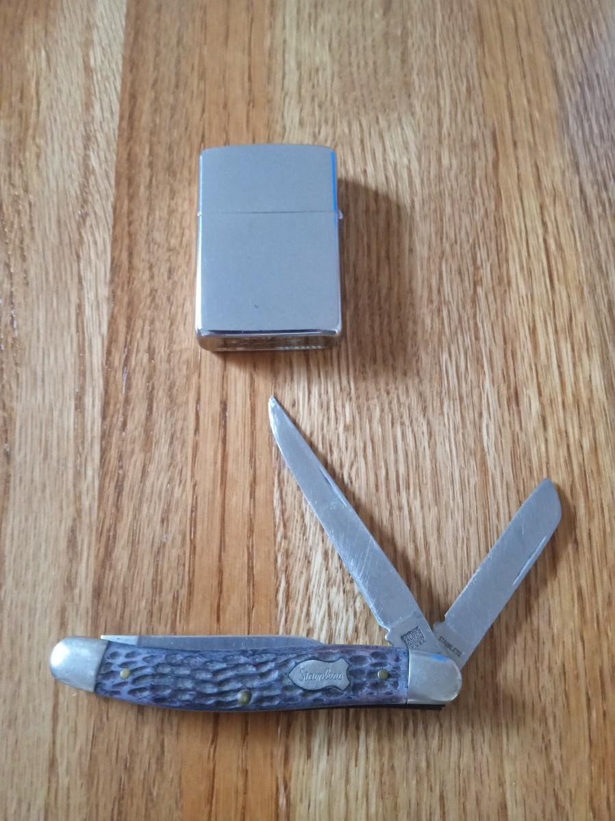 SCHRADE FOLDING POCKET KNIFE AND A ZIPPO LIGHTER