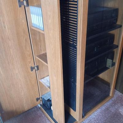STEREO CABINET WITH SMOKEY GLASS AND AMPLE MEDIA STORAGE