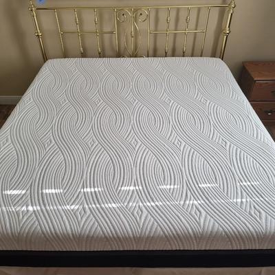 King Size Bed with Gold Headboard and Linen