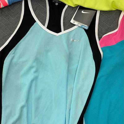 Set of 4 Womenâ€™s Nike Dri Fit Workout Shirts
