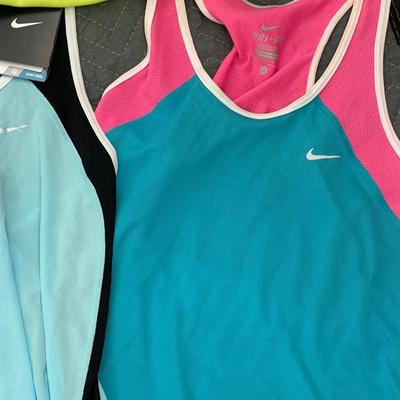 Set of 4 Womenâ€™s Nike Dri Fit Workout Shirts