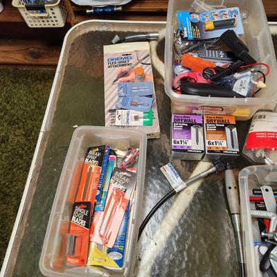 Table lot of hardware, nails, peg hooks, Dremel attachments,clamps,bits WYSIWYG